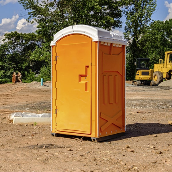 how often are the portable restrooms cleaned and serviced during a rental period in Peru